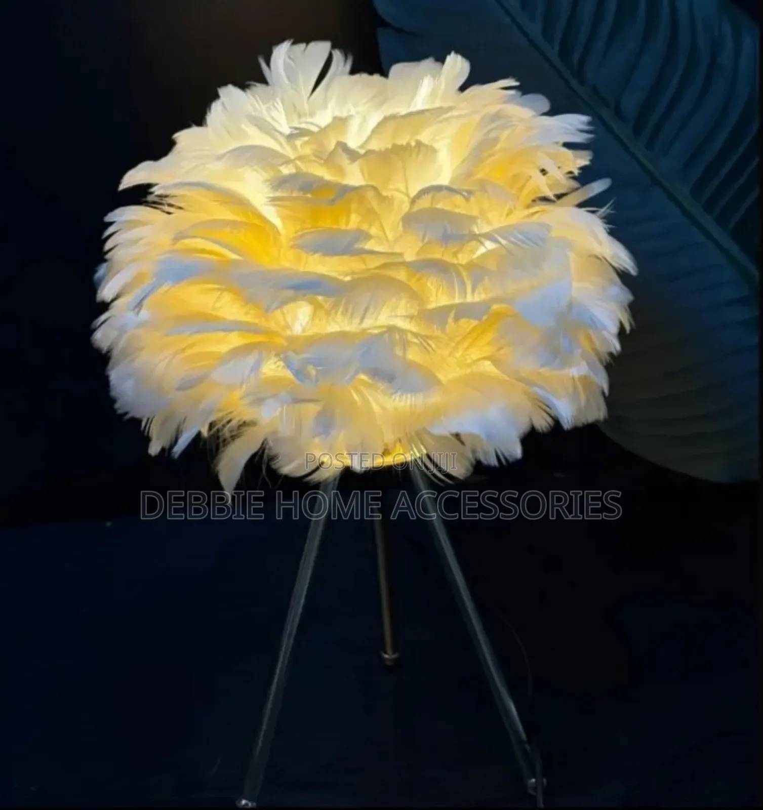White Feather Table Lamp With a Tripod Base