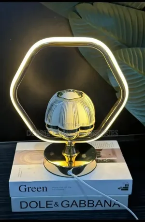 Modern Crystal Table Lamp With a Gold-Colored Geometric Frame