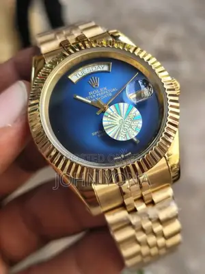 Rolex Day-Date Watch in Yellow Gold With a Blue Dial