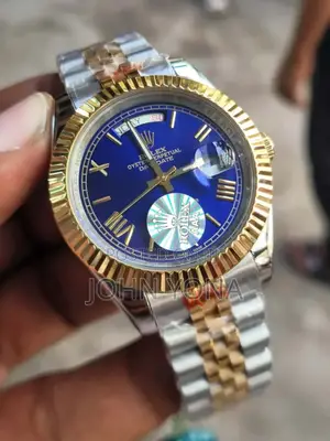 Rolex Day-Date Watch and a Two-Tone Metal