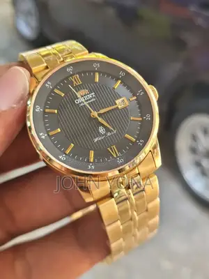 Orient Bambino Open Heart Automatic Watch With a Gold-Toned Case