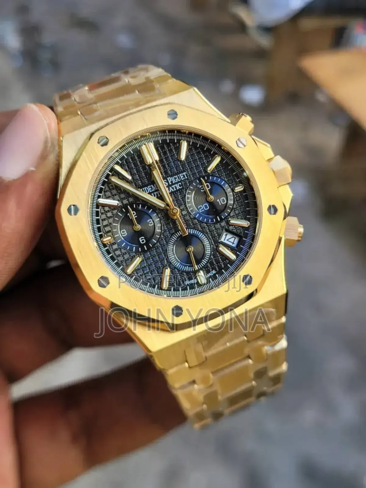Audemars Piguet Royal Oak Chronograph Watch With a Black Dial