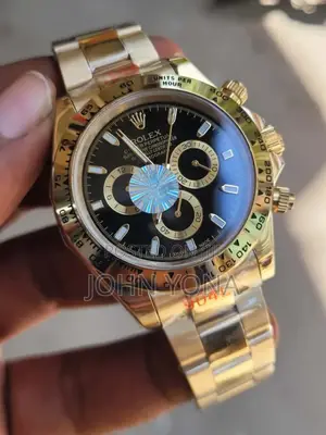 Rolex Oyster Perpetual Cosmograph Daytona Gold Case and a Black Dial