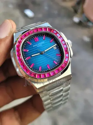 Patek Philippe Nautilus With Blue Dial a Bezel Set With Pink Gemstones