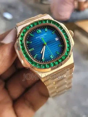 Patek Philippe Nautilus With Bezel Set With Green Emeralds Blue Dial