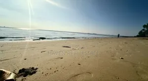 A Sunset Beach Cliff Plot for Sale at Zanzibar