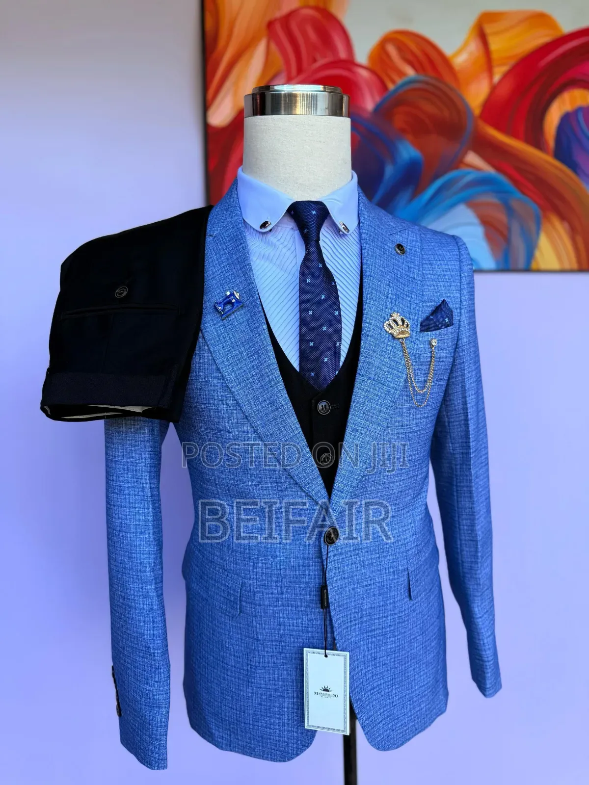 Light Blue Jacket and Black Tro Suit