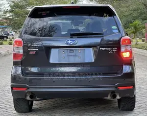 Subaru Forester 2.0XT Touring 4dr SUV AWD (2.0L 4cyl Turbo CVT) 2014