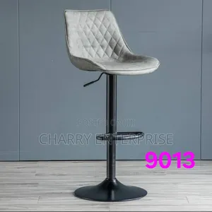 Adjustable Bar Stool With a Backrest and Footrest.