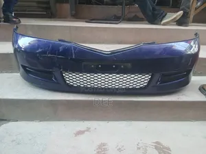 This Is a Used Front Bumper for a Mazda Demio (Dy Series, or Mazda 2).