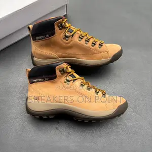 This Is a Pair of Caterpillar Work Boots,