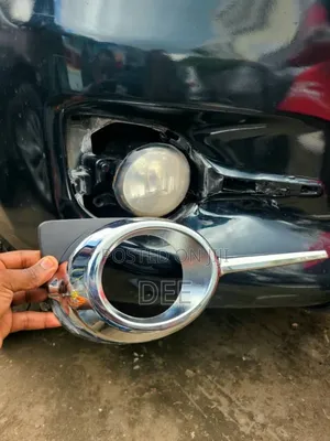 Chrome Front Bumper Fog Light Cover Trim for a Toyota Vanguard