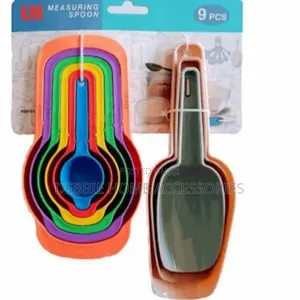 Set Of Nine Plastic Measuring Spoons And Scoops.