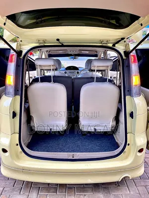 Toyota Sienta 1.5 AWD 2004 Yellow