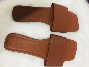 Pair of Brown Flat Slider Sandals