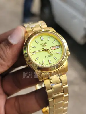 Gold-Tone Seiko 5 Automatic Watch With a Yellow Dial