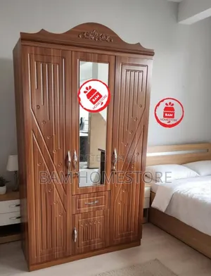 Elegant 3-Door Wardrobe With Mirror Carved Details - Kabati La Nguo