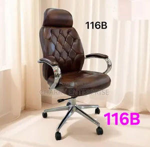 Leather Executive Office Chair With Chrome Arms and a Rolling Base.