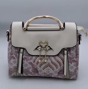 Chic Pink Patterned Handbag With Swan Claps