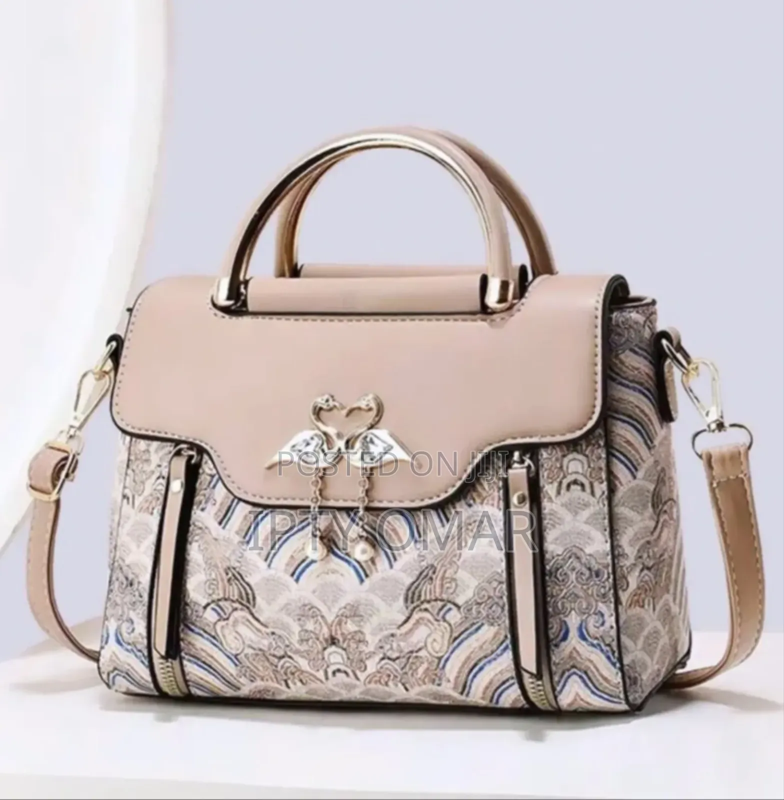 Chic Beige Patterned Handbag With Swan Claps