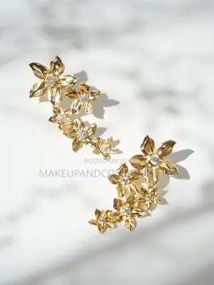 Pair of Max Flower Design Earrings in Gold-Tone Metallic Material