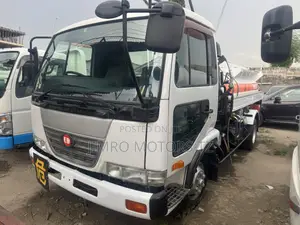  Vehicle Specifications: • Model: Nissan Diesel Condor Ud Oil T