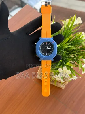 G-Shock Watches Orange Colour and Light Blue Case Water Resistant