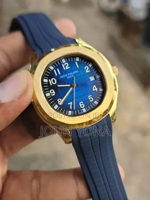 Patek Philippe Aquanaut With a Gold Case and a Blue Dial