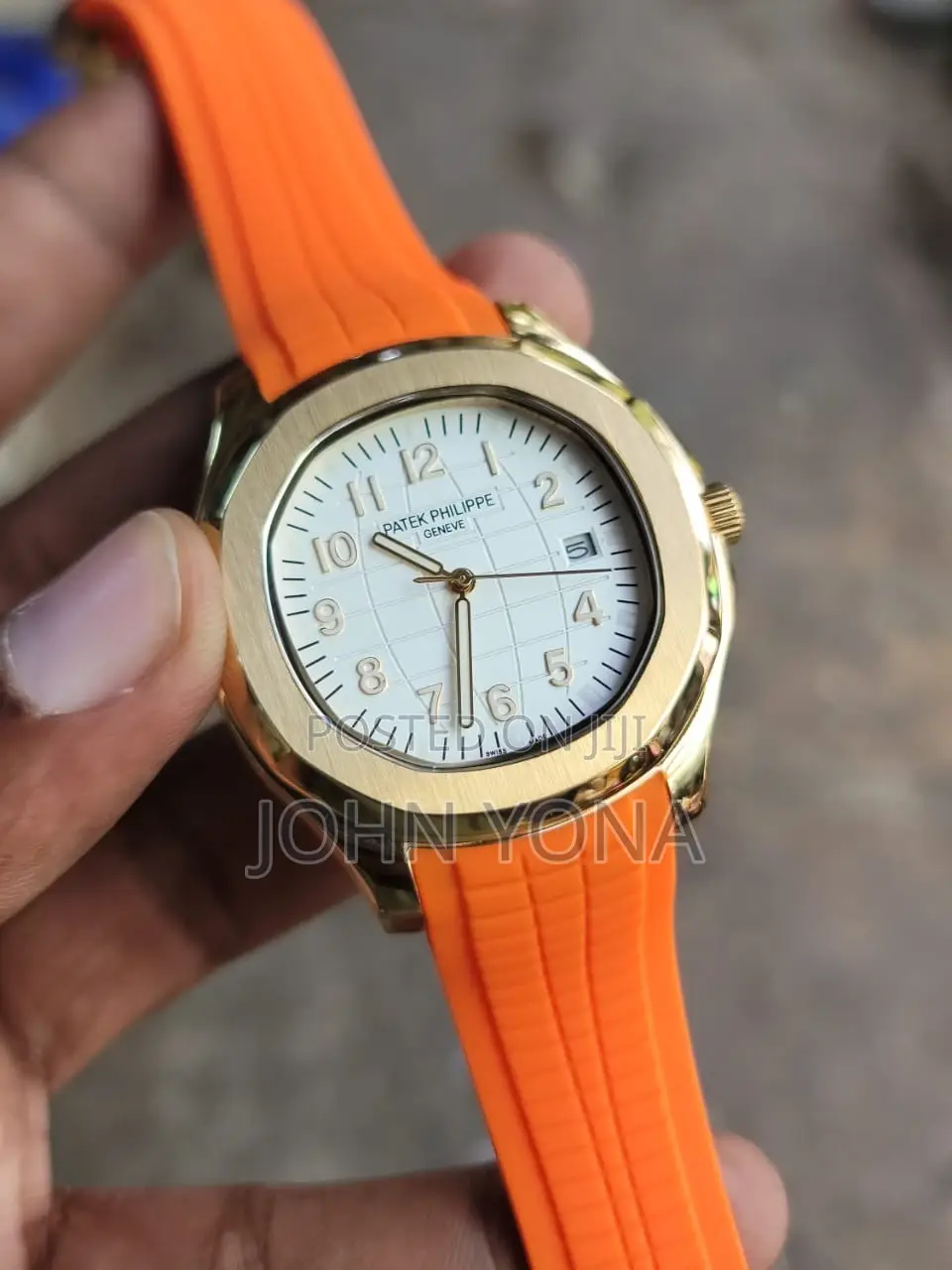 Patek Philippe Aquanaut With a Gold Case and a Vibrant Orange Strap
