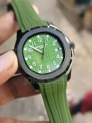 Patek Philippe Aquanaut, Featuring a Green Rubber Strap and Black Case