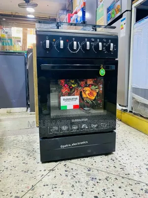 Jiko Plate 3 Gas , 1 Umeme Na Oven ( Offaa 450,000/= )