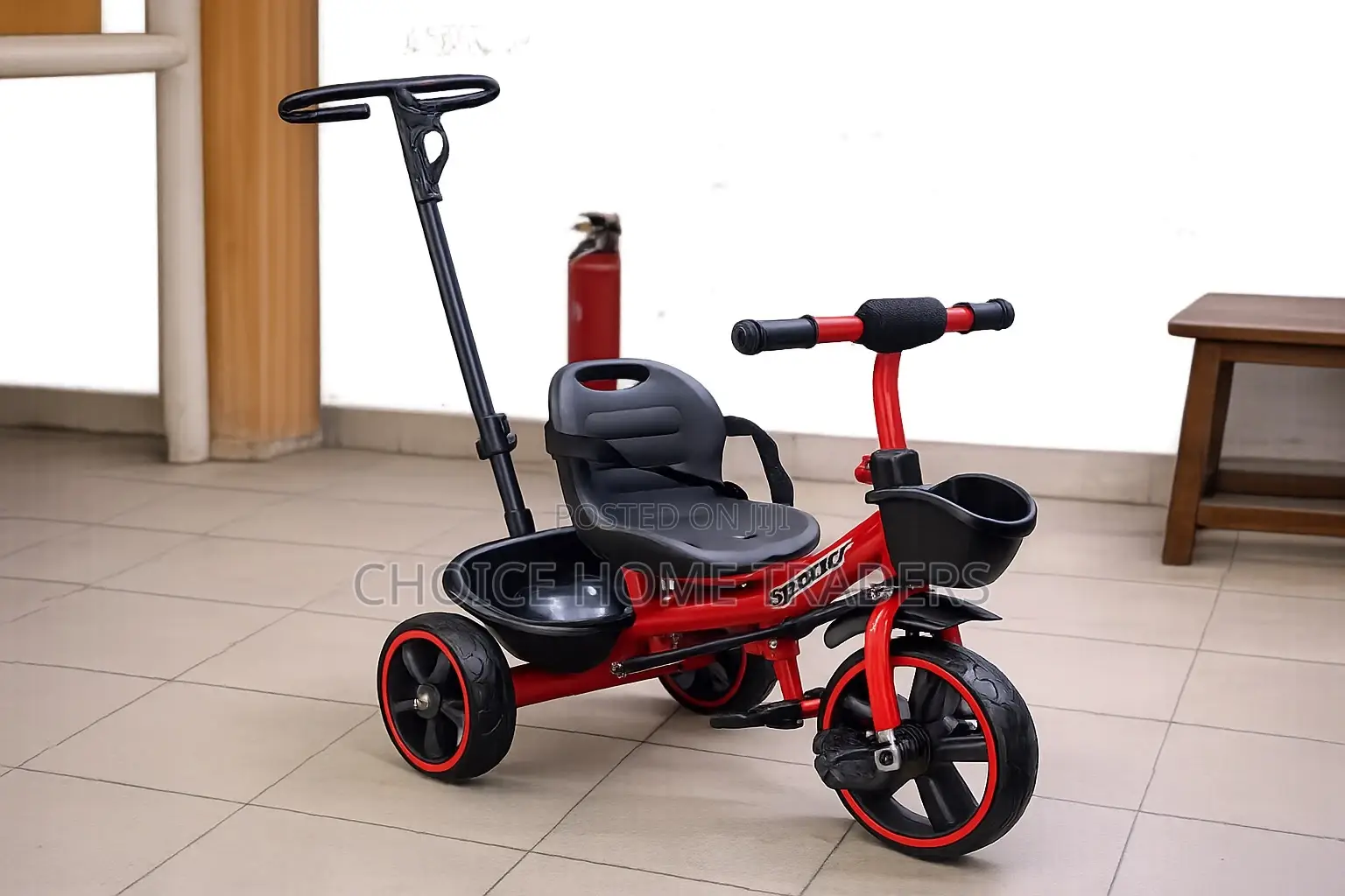 Red and Black Tricycle Kid