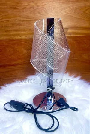 Modern Decorative Table Lamp Featuring a Patterned Acrylic Shade
