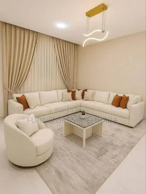 Round Sofa Design and It's Coffee Table