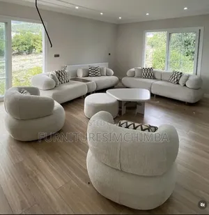Round Sofa Design and It's Coffee Table