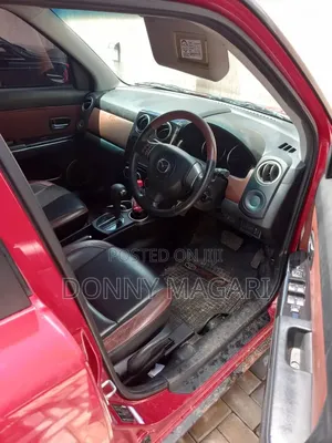 Mazda Verisa 2010 Red