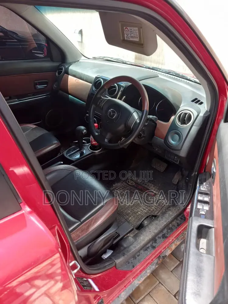 Mazda Verisa 2010 Red
