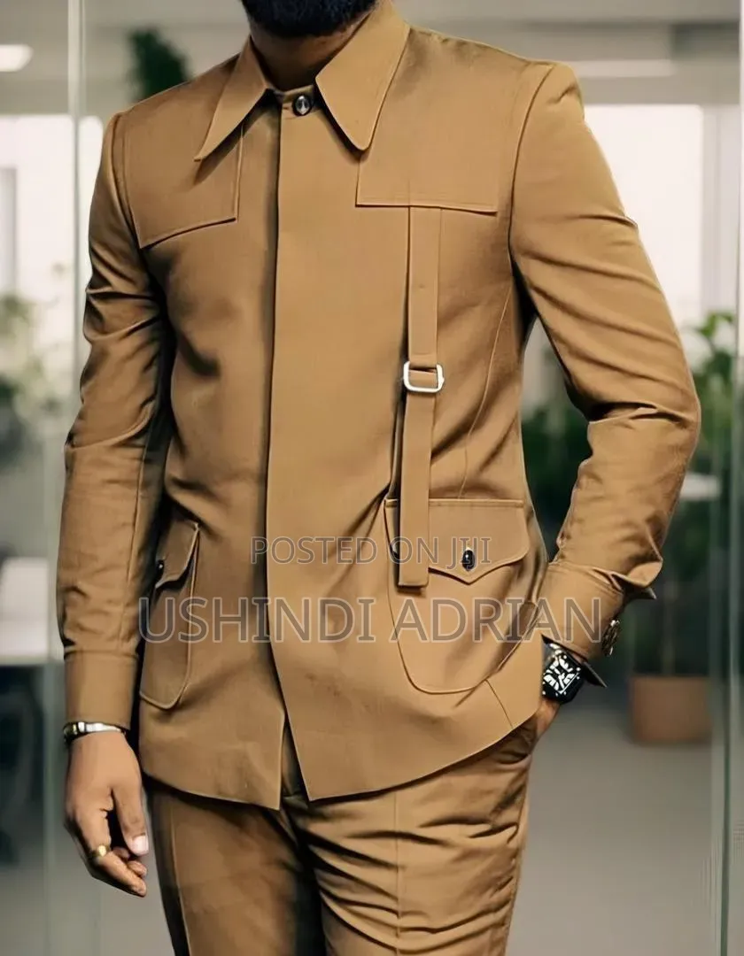 Kaunda SutiPrice: 200,000/=Size: 44 – 58