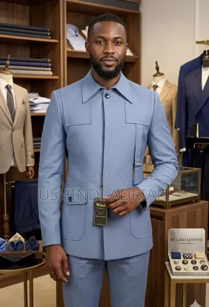 Kaunda SutiPrice: 200,000/=Size: 44 – 58