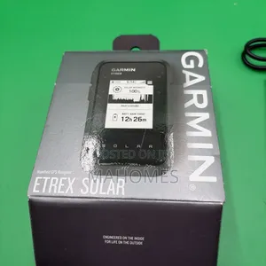 Garmin E Trex Solar Handheld GPS
Navigator in Its Packaging