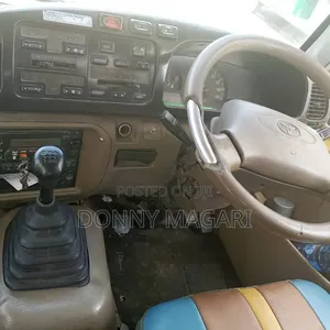 Toyota Coaster 2002 Yellow