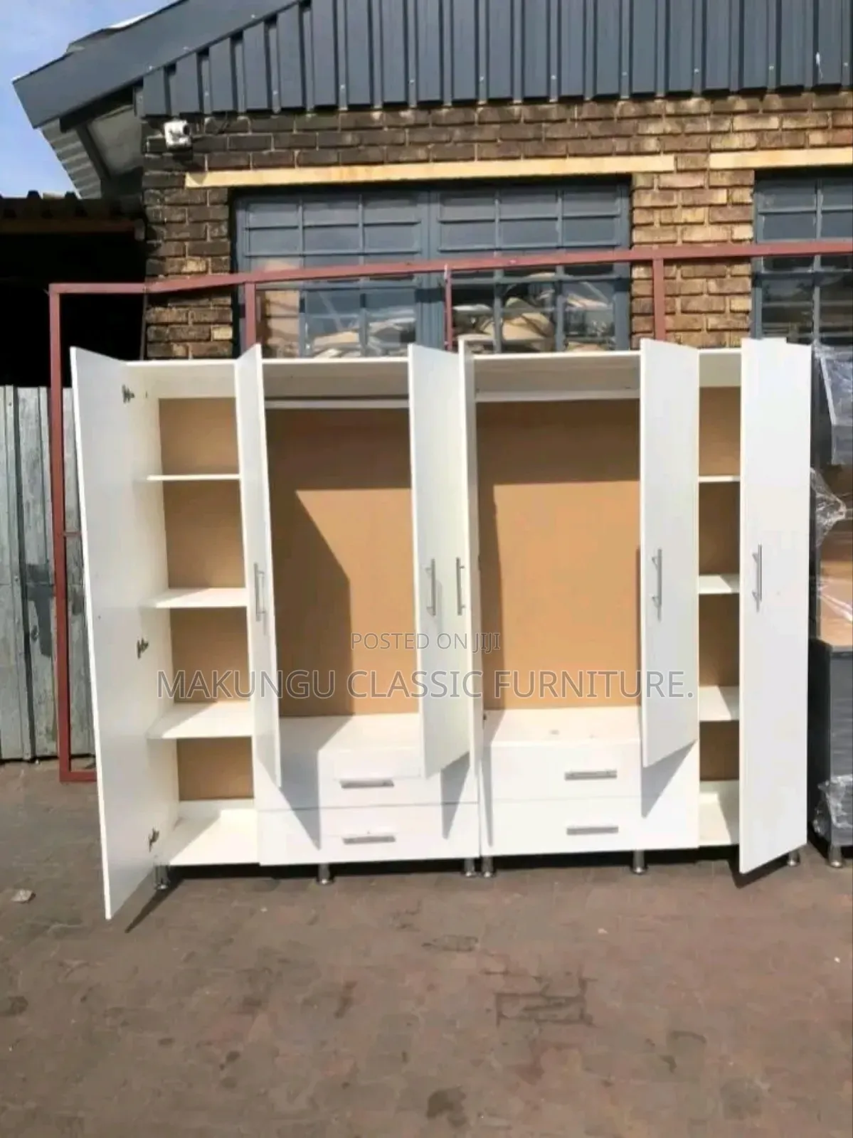 Six Doors Wardrobe With Simple White Color