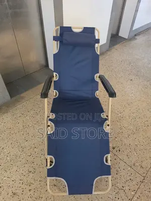 This Blue Portable Folding Beach Chair Features a Steel Frame And