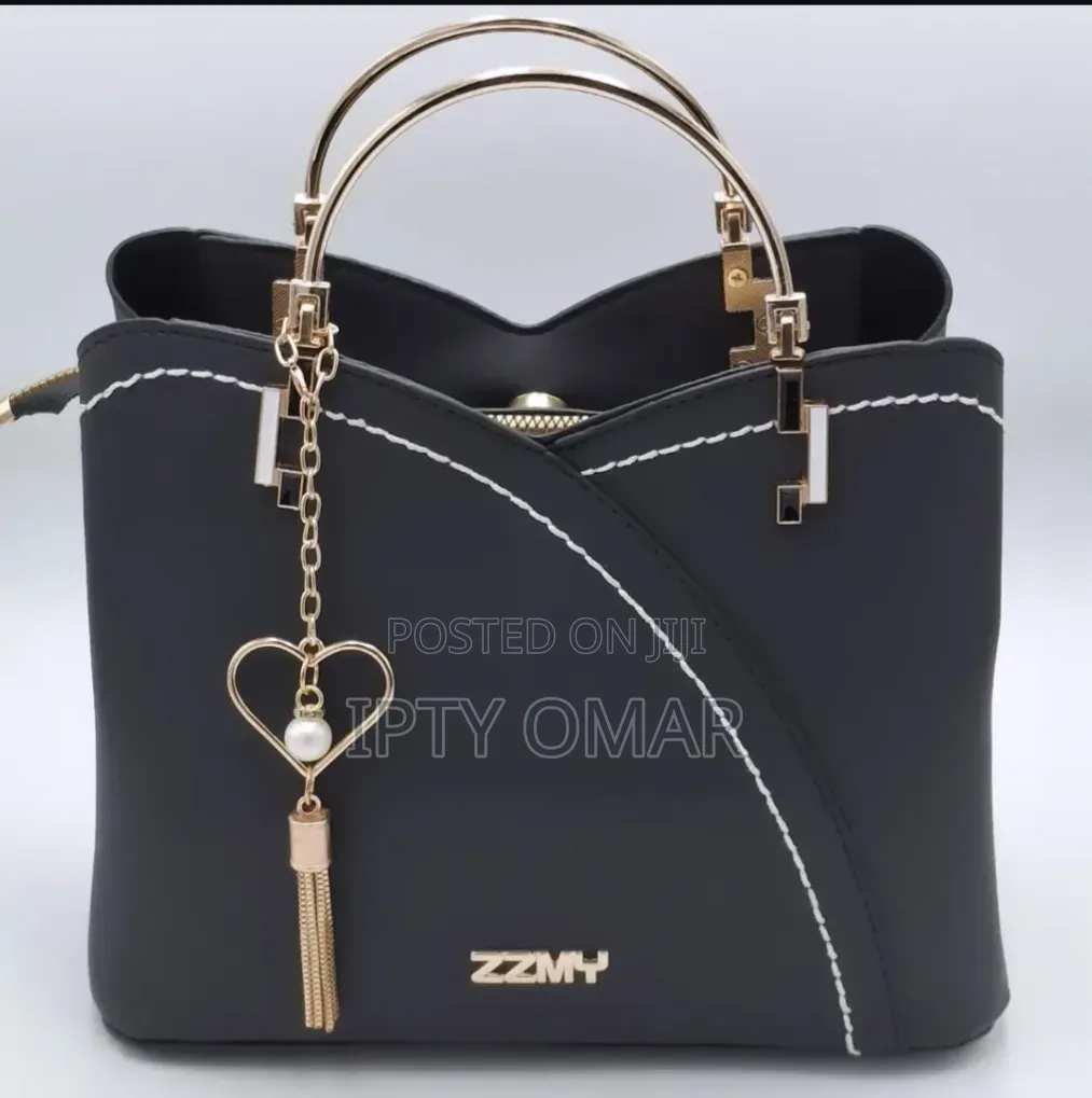 Chic Black Handbag With Stylish Heart Charm