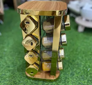 Gluck Rotating Spice Setfeatures a Gold-Finished Rack With 12 Glass