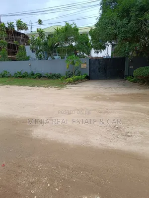 Plot for Sale in Masaki With the Building Inside the Compound