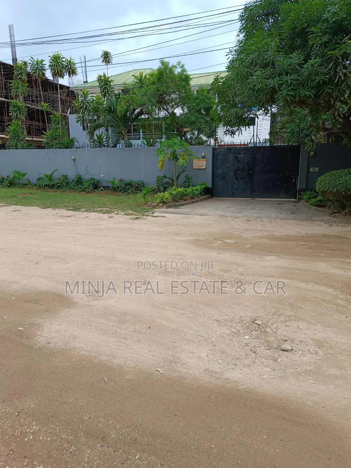 Plot for Sale in Masaki With the Building Inside the Compound
