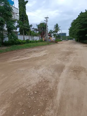 Plot for Sale in Masaki With the Building Inside the Compound