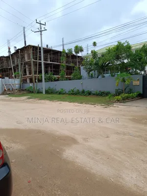 Plot for Sale in Masaki With the Building Inside the Compound