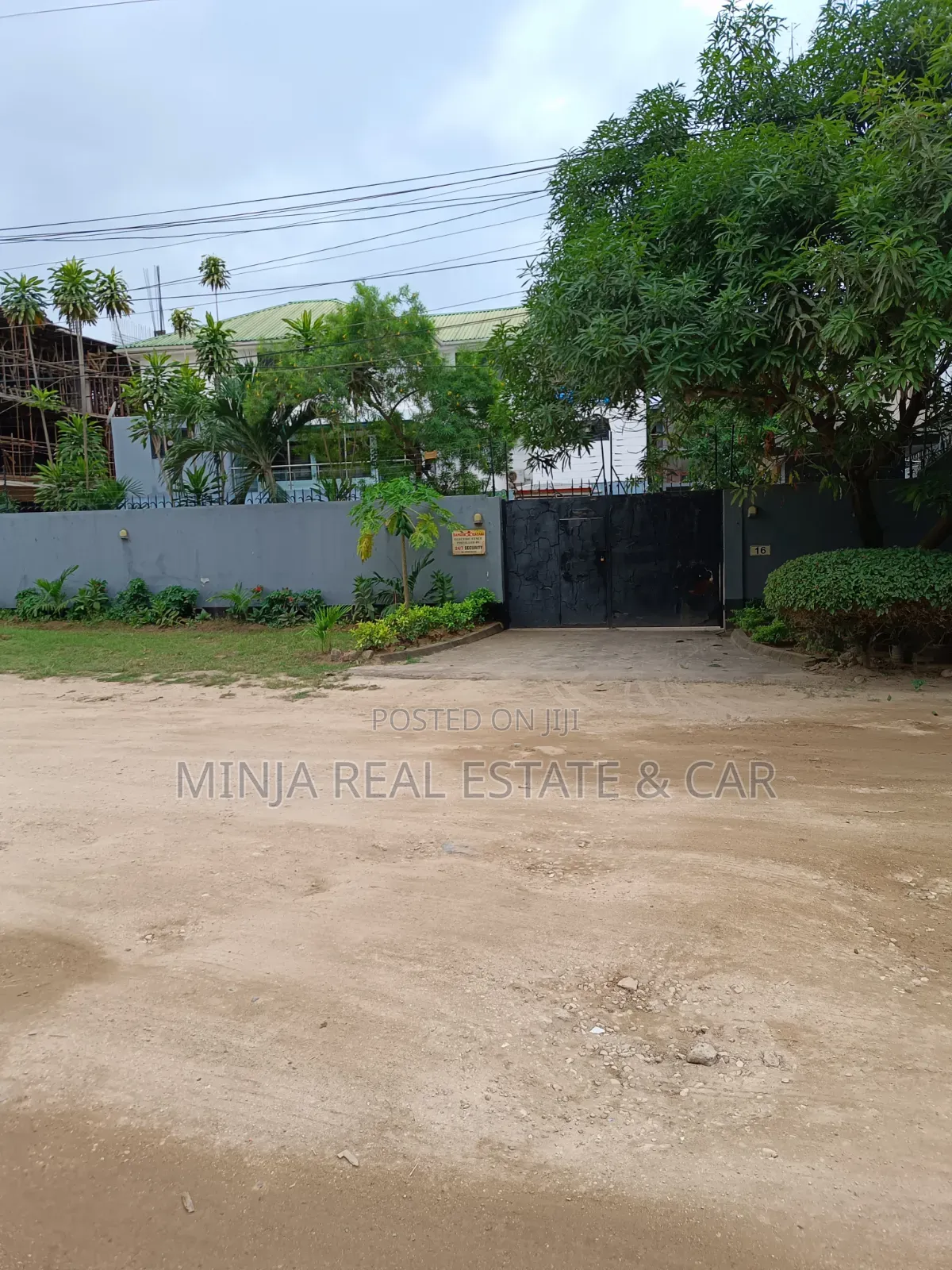 Plot for Sale in Masaki With the Building Inside the Compound